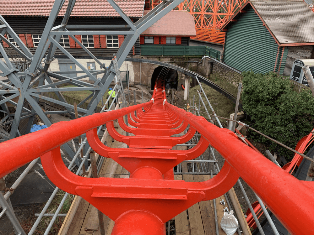 The new Big One rollercoaster track with fresh red paint.