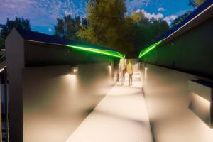 Taziker FRP footbridge walkway with lighting at night time. 3D mockup.