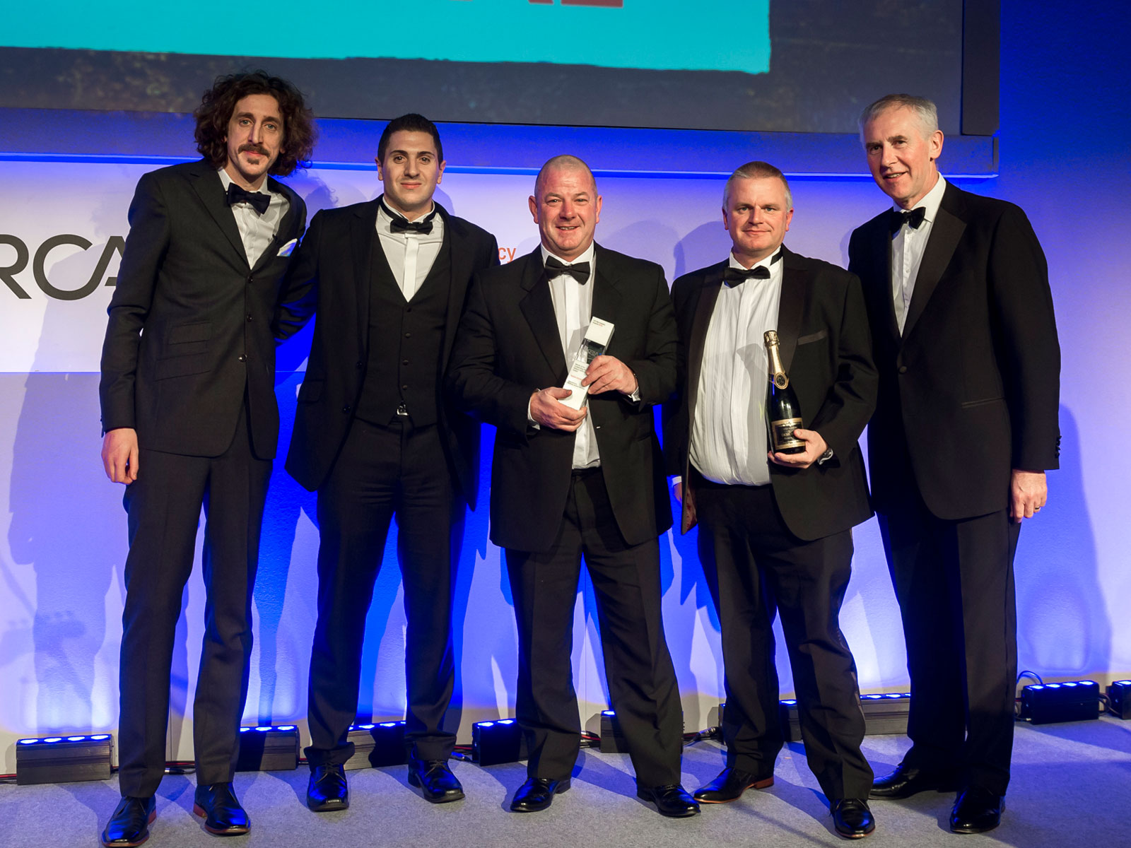 Taziker team receiving award at UK Rail Industry Awards.