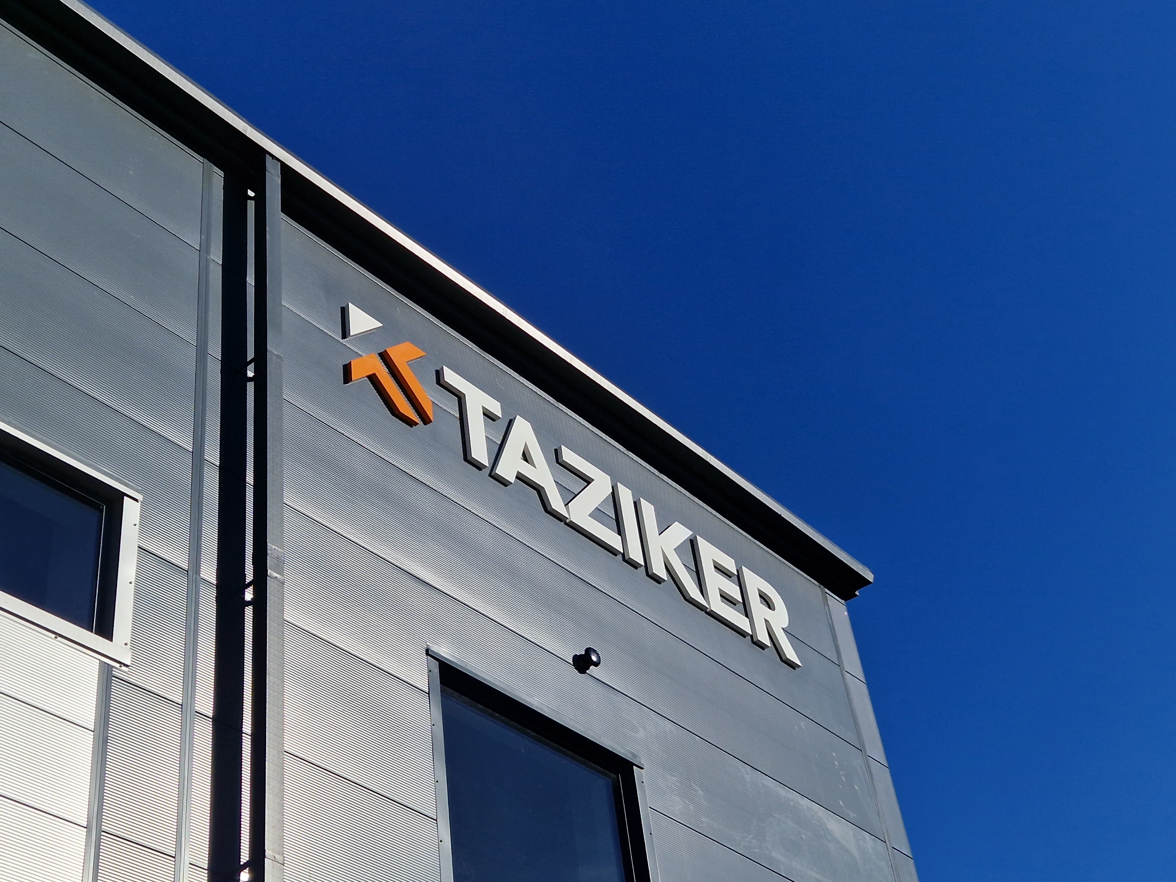 Taziker signage on the outside of the new fabrication facility in Blackburn.