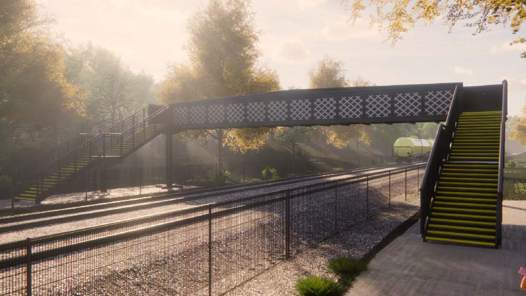 Taziker FRP footbridge design over railway tracks in the daytime. 
