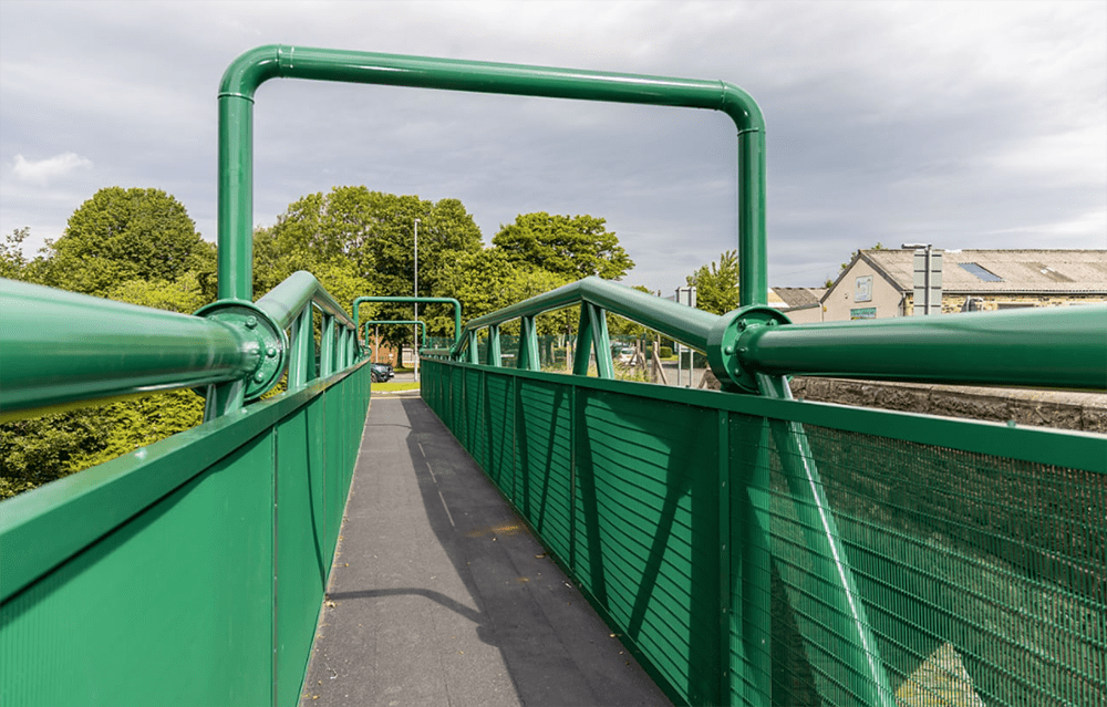 Newly painted green footbridge in Heywood.